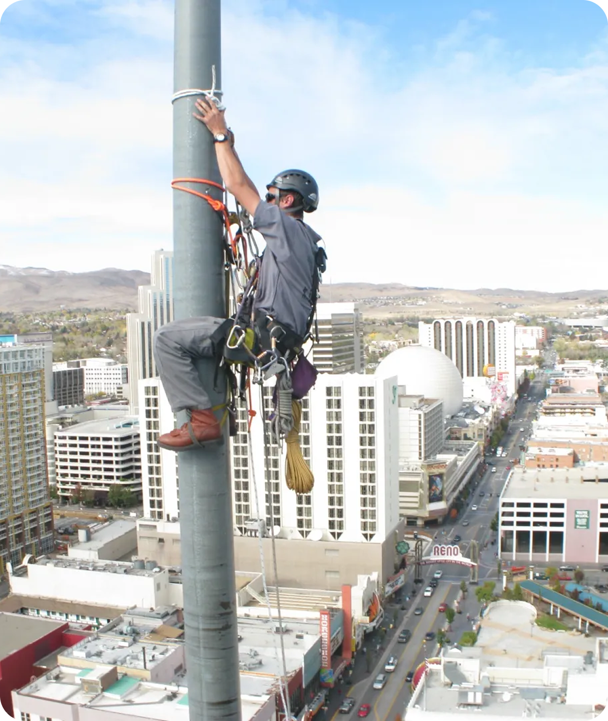 High-altitude worker with safety gear